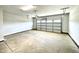 Spacious two-car garage with open layout and neutral-colored flooring at 211 Hopewell Branch Ct, Smithfield, NC 27577