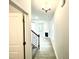 Bright foyer with hardwood floors, staircase, and fireplace at 211 Hopewell Branch Ct, Smithfield, NC 27577