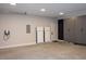 Finished garage with Tesla Powerwall and storage cabinets at 23930 Cherry, Chapel Hill, NC 27517