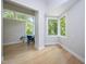 Sunlit home office with hardwood floors and a built-in workspace at 23930 Cherry, Chapel Hill, NC 27517