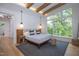 Bright bedroom with large windows and a view of the woods at 23930 Cherry, Chapel Hill, NC 27517