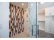 Walk-in shower with modern geometric patterned tile at 23930 Cherry, Chapel Hill, NC 27517