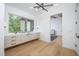 Modern bathroom with a floating vanity and large window at 23930 Cherry, Chapel Hill, NC 27517