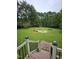 Backyard with firepit and spacious grassy area at 95 Crownside Dr, Four Oaks, NC 27524