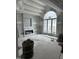 Large living room with a fireplace and arched window at 22005 Turner, Chapel Hill, NC 27517