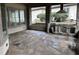Covered patio with stone flooring and built-in grill at 22005 Turner, Chapel Hill, NC 27517