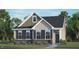 Two-story house with gray and beige siding, dark windows, and landscaping at 1309 White Verona Way, Knightdale, NC 27545