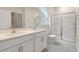 Bathroom with double vanity, large shower, and updated fixtures at 1309 White Verona Way, Knightdale, NC 27545