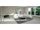 Spacious bonus room with comfortable seating and game table at 9417 Rawson Ave, Raleigh, NC 27613