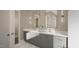 Elegant bathroom with double vanity and marble flooring at 9417 Rawson Ave, Raleigh, NC 27613