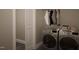 Laundry room with washer, dryer, and hanging rod at 9417 Rawson Ave, Raleigh, NC 27613
