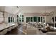 Open floor plan great room with kitchen, seating area and access to backyard at 9417 Rawson Ave, Raleigh, NC 27613