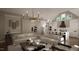 Bright living room with a wine rack and comfortable seating at 9417 Rawson Ave, Raleigh, NC 27613