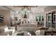 Open concept kitchen and living area with modern appliances and high ceilings at 9417 Rawson Ave, Raleigh, NC 27613