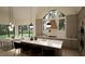 Modern kitchen with large island and ample natural light at 9413 Rawson Ave, Raleigh, NC 27613