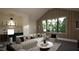 Elegant living room with a comfortable seating area and large windows at 9413 Rawson Ave, Raleigh, NC 27613