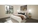 Serene bedroom with a king-size bed and natural light at 9413 Rawson Ave, Raleigh, NC 27613