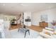 Bright living room with hardwood floors, comfortable seating, and large windows at 515 W Lenoir St # 101, Raleigh, NC 27601
