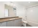 Clean bathroom with a tub, toilet and modern vanity at 515 W Lenoir St # 101, Raleigh, NC 27601