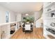 Modern dining room with hardwood floors and built-in shelving at 515 W Lenoir St # 101, Raleigh, NC 27601