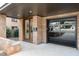 Modern home with a glass garage door and brick exterior at 515 W Lenoir St # 101, Raleigh, NC 27601