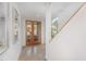 Bright and spacious entryway with polished concrete floors and modern wooden doors at 515 W Lenoir St # 101, Raleigh, NC 27601