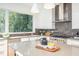 Stylish kitchen boasting modern cabinetry and a large gas range at 515 W Lenoir St # 101, Raleigh, NC 27601