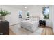 Bright bedroom featuring a comfortable bed and plenty of natural light at 515 W Lenoir St # 101, Raleigh, NC 27601