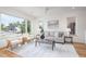 Spacious living area featuring hardwood floors and ample natural light at 515 W Lenoir St # 101, Raleigh, NC 27601