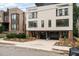 Modern two-unit building with attractive brick exterior and attached garages at 515 W Lenoir St # 101, Raleigh, NC 27601