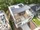 Modern home with rooftop solar panels and multiple decks at 515 W Lenoir St # 101, Raleigh, NC 27601