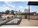 Spacious rooftop deck with city views and solar panels at 515 W Lenoir St # 101, Raleigh, NC 27601