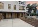 Modern two-story home with attached garage and brick exterior at 515 W Lenoir St # 102, Raleigh, NC 27601