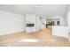 Bright living room with hardwood floors and built-in shelving at 515 W Lenoir St # 102, Raleigh, NC 27601