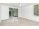 Spacious bedroom with sliding glass doors to patio at 515 W Lenoir St # 102, Raleigh, NC 27601