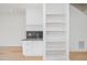 Modern wet bar with white cabinetry and a sleek sink at 515 W Lenoir St # 102, Raleigh, NC 27601