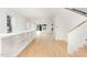 Spacious living area with hardwood floors, high ceilings and built-in shelving at 515 W Lenoir St # 102, Raleigh, NC 27601