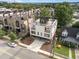 Modern home with rooftop deck and solar panels, aerial view at 515 W Lenoir St # 102, Raleigh, NC 27601