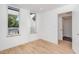 Bright bedroom with hardwood floors and large windows at 515 W Lenoir St # 102, Raleigh, NC 27601