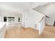 Open living room with hardwood floors and built-in shelves at 515 W Lenoir St # 102, Raleigh, NC 27601