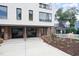 Modern two-unit building with sleek design and double garages at 515 W Lenoir St # 102, Raleigh, NC 27601