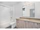 Modern bathroom with a soaking tub and floating vanity at 515 W Lenoir St # 102, Raleigh, NC 27601