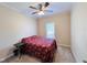 Bedroom with a floral-print bed and ceiling fan at 15 Meadow View Ct, Fuquay Varina, NC 27526