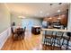 Bright dining area adjacent to the kitchen with hardwood floors at 15 Meadow View Ct, Fuquay Varina, NC 27526