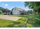 Backyard view showcasing patio and green space at 15 Meadow View Ct, Fuquay Varina, NC 27526