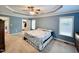 Large main bedroom with ceiling fan and walk-in closet at 15 Meadow View Ct, Fuquay Varina, NC 27526