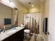 Bathroom with shower/tub combo and granite vanity at 15 Meadow View Ct, Fuquay Varina, NC 27526