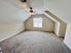 Spacious bedroom with a ceiling fan and large window at 15 Meadow View Ct, Fuquay Varina, NC 27526