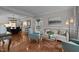 Living room with hardwood floors, comfortable seating, and view to dining room at 4600 Scottland Dr, Mebane, NC 27302