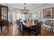 Formal dining room with large table and chandelier at 4600 Scottland Dr, Mebane, NC 27302
